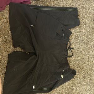 Black and green scrub star pants